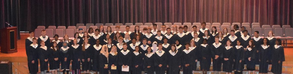2019 National Honor Society members and new inductees on auditorium stage