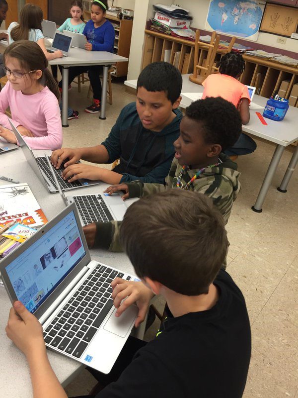 elementary students using Chromebooks