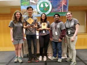 Envirothon team holds plaque