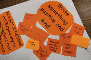 positive notes on orange paper