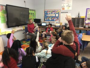 April Prestipno reads to elementary students