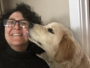 teacher kissed by dog