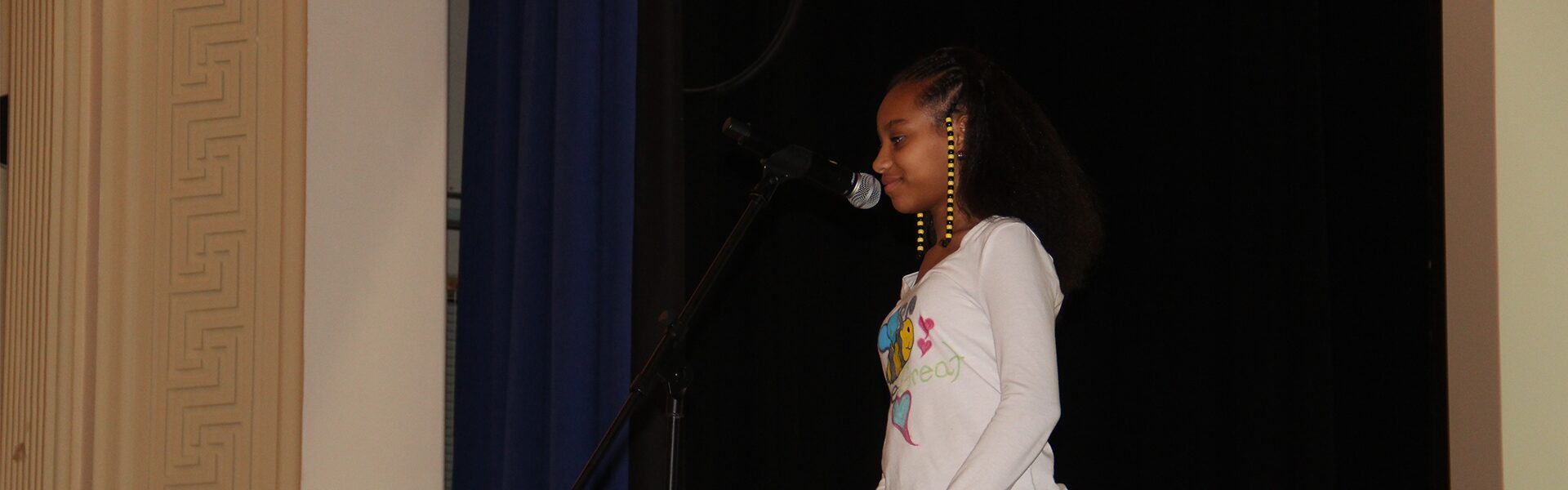 Spelling bee participant smiling